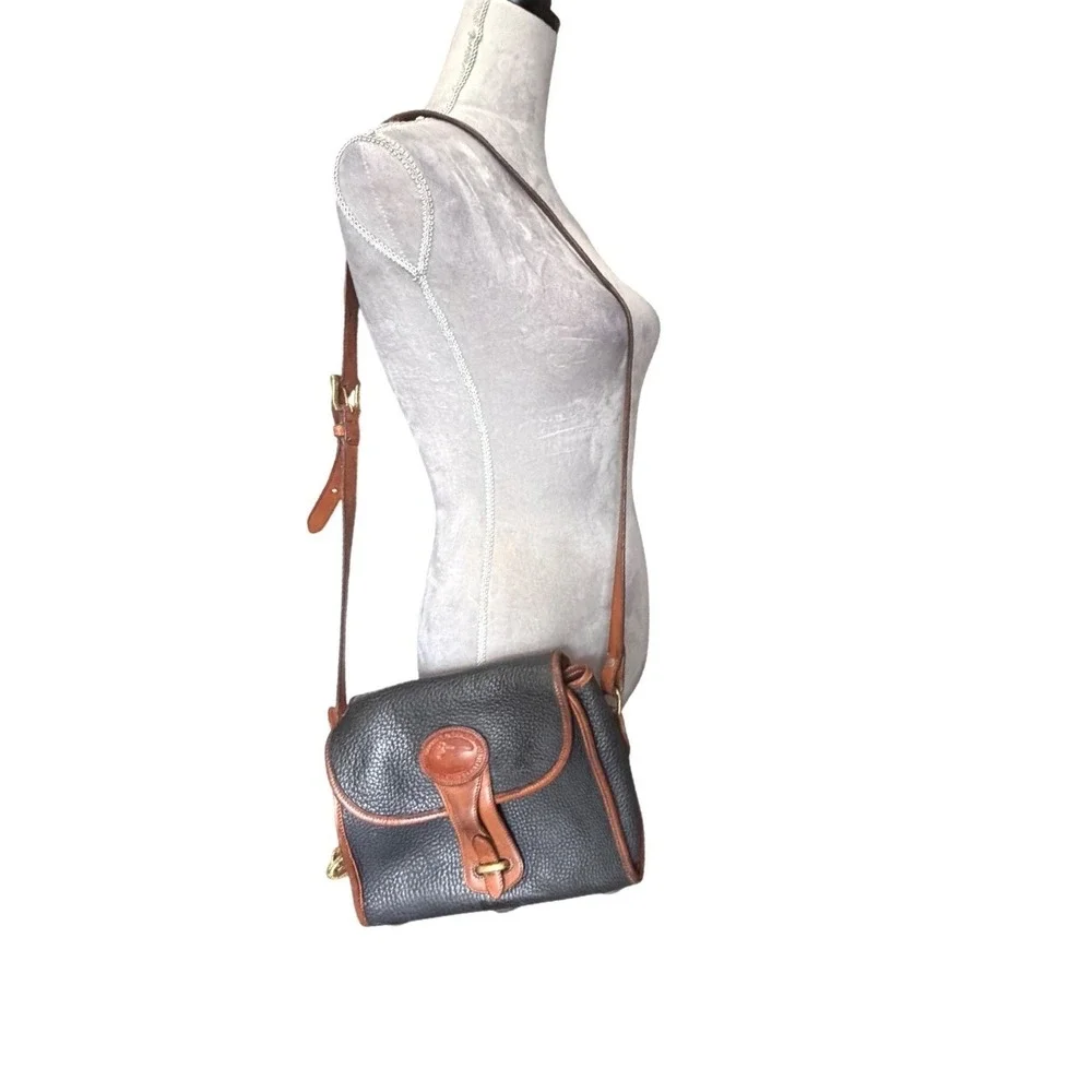 Dooney & Bourke All Weather Leather Vintage Navy Crossbody Bag Brass Duck Fob